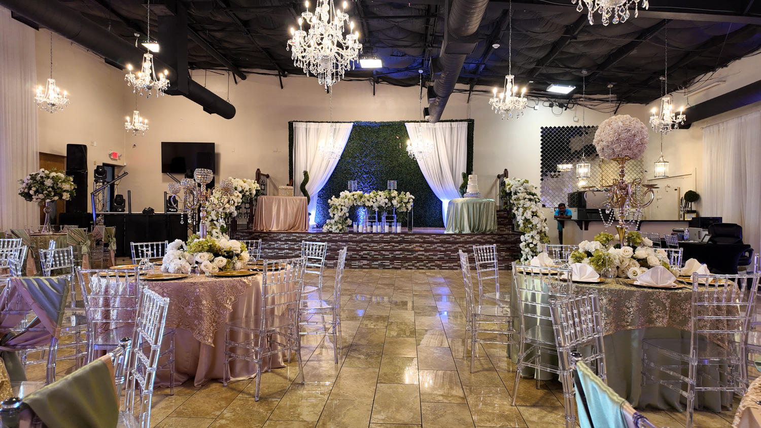 Lively quinceañera celebration with vibrant decor and personalized touches by Alegria Gardens event planners.