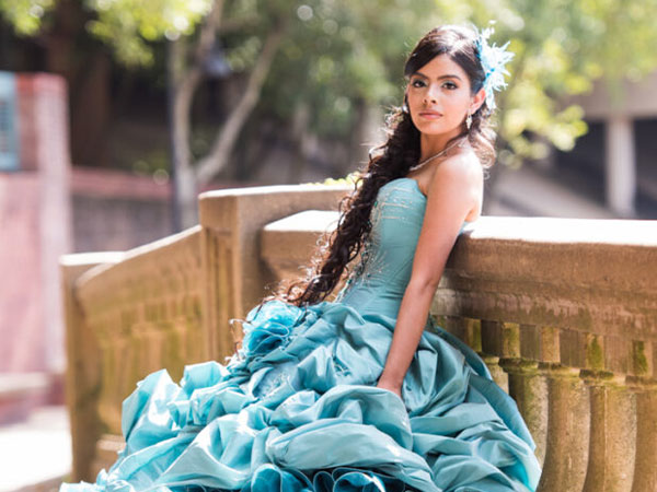 Cynthia Morales, a birthday celebrant wearing an aquamarine gown for her event organized by Alegria Gardens.