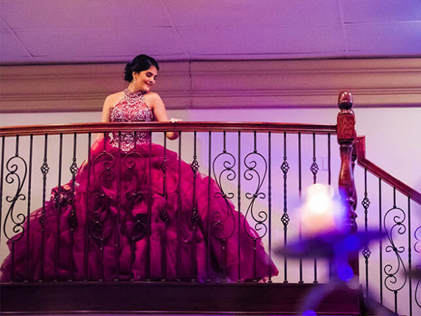 Quinceañera celebrant  providing a glowing testimonial about their event planning services.