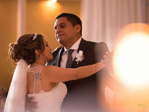 Bride and groom dancing at private wedding reception hall - Alegria Gardens - Houston, TX