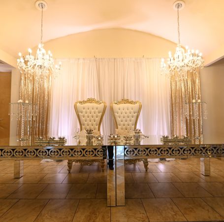 Texan bride and groom taking photo outside of private wedding reception venue - Alegria Gardens