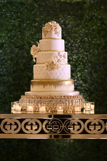 Modern and elegant decorations and setup for wedding cake provided by Alegria Gardens.