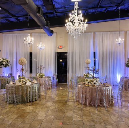 Houston bride and groom cutting wedding cake - Alegria Gardens